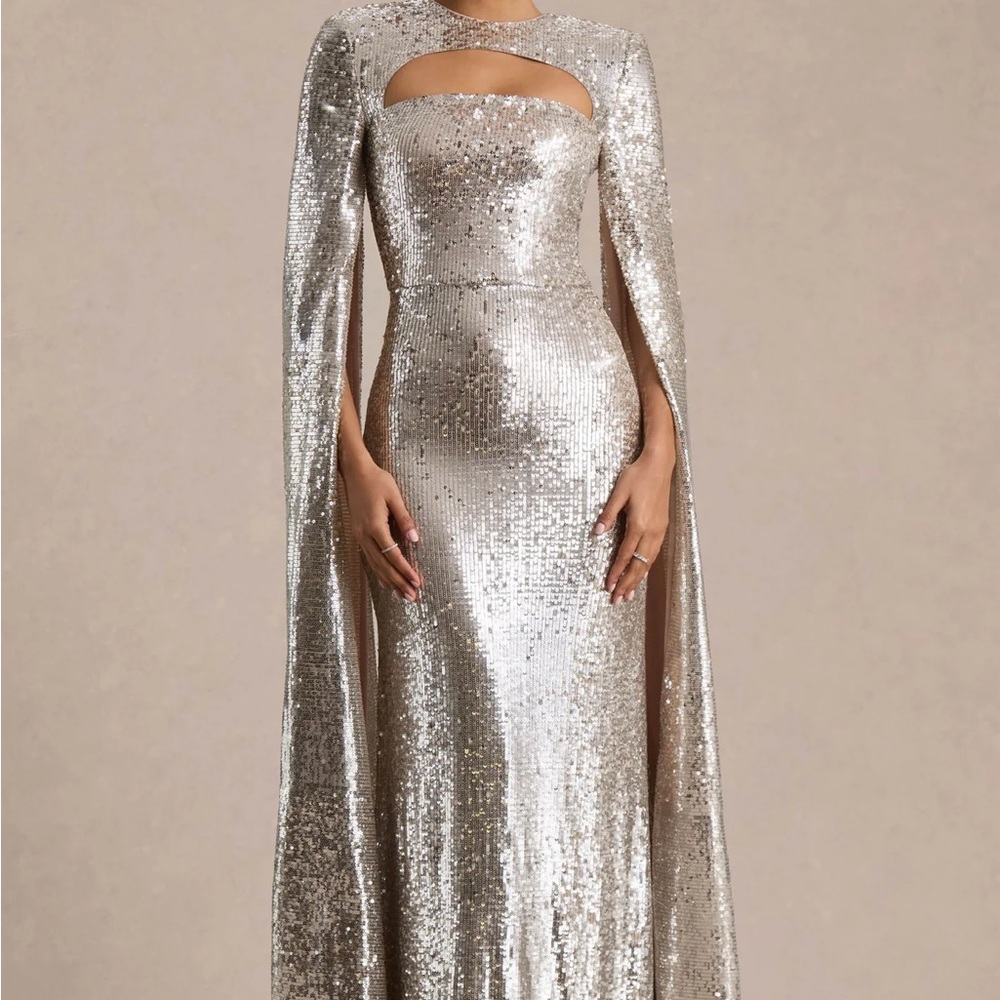 Club London- DEVORA
Silver Sequin Crew-Neck Maxi Dress With Cape Sleeves